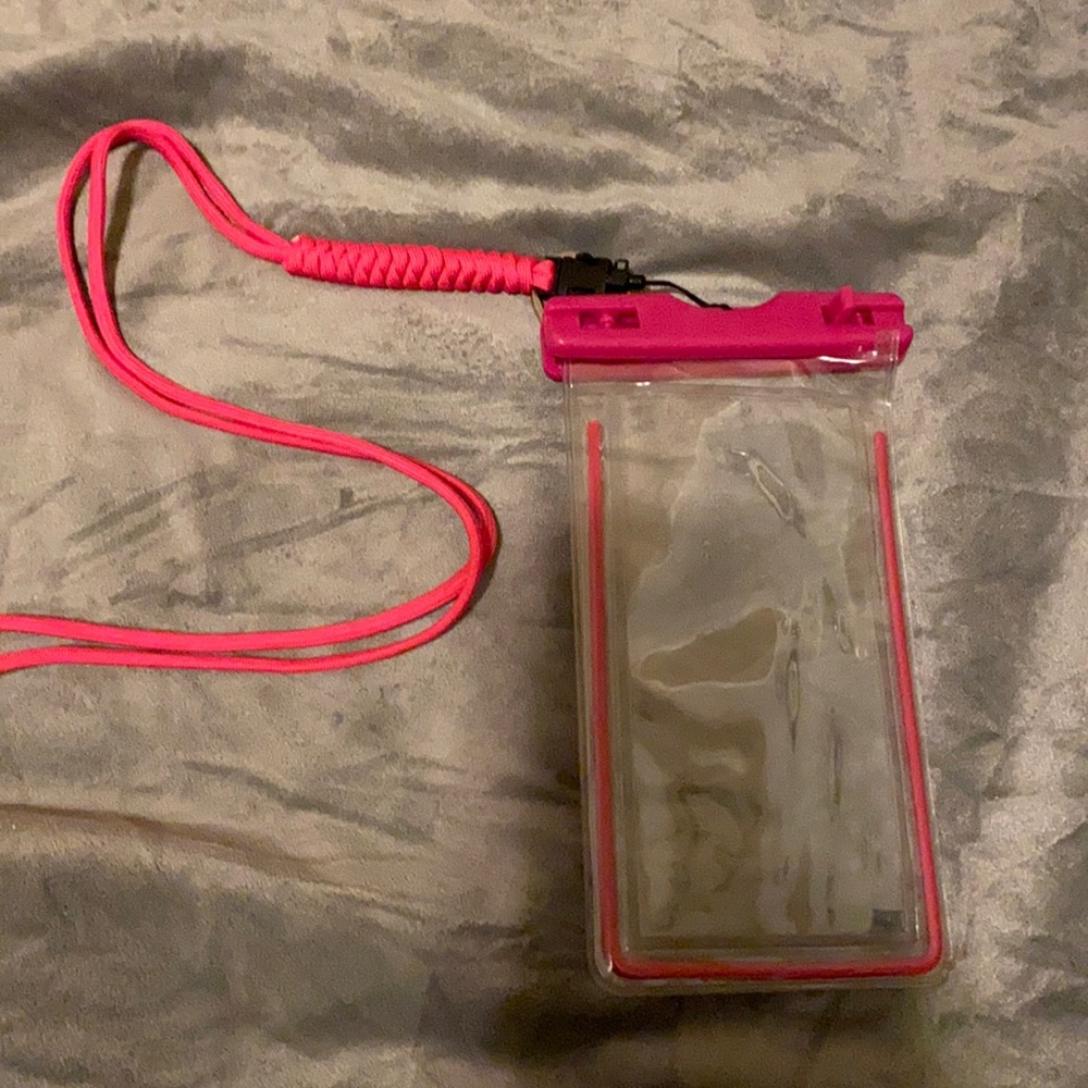 A pink necklace waterproof phone holder . It can be taken into the swimming pool